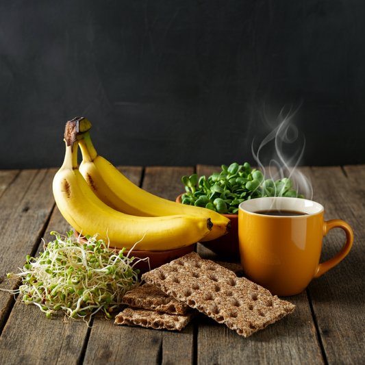 A colorful display of TCS food items including bananas, coffee, crackers, and sprouts.